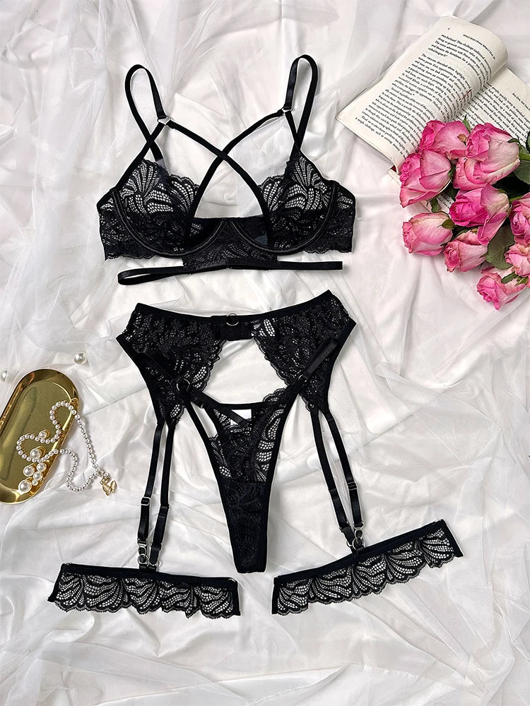 Elegant black lace lingerie set with strappy bra, garter belt and thong with floral details