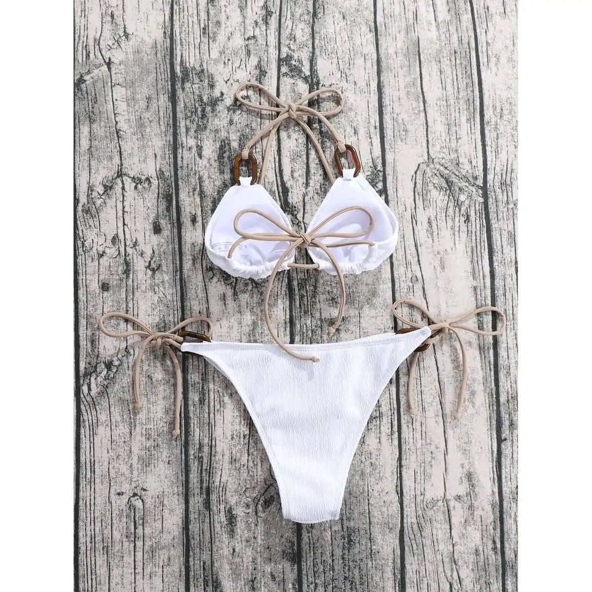 White eco-friendly bikini in textured fabric with wooden rings