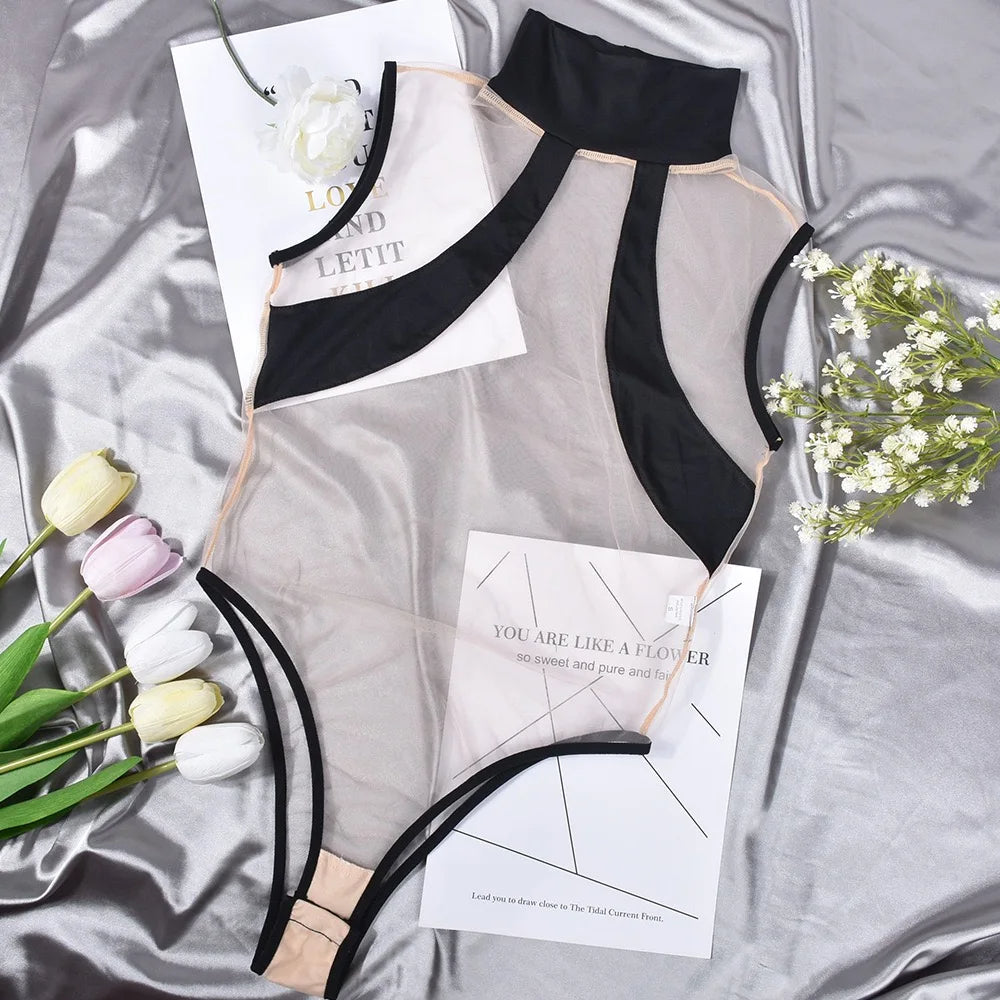 Sheer high neck bodysuit with black details and bold cutouts
