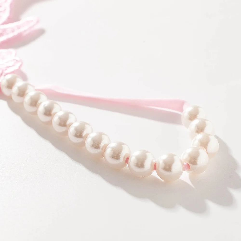 Butterfly lace thong with pearl details